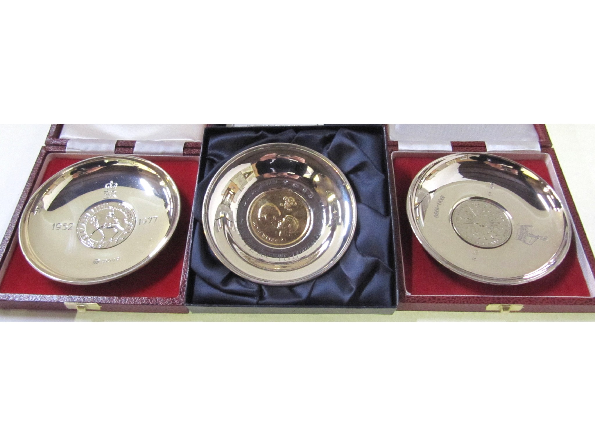 Appraisal: A lot comprising three cased silver commemorative dishes London and