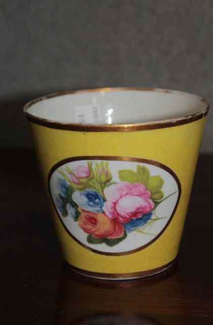 Appraisal: A TH CENTURY ENGLISH PORCELAIN YELLOW GROUND BEAKER the oval