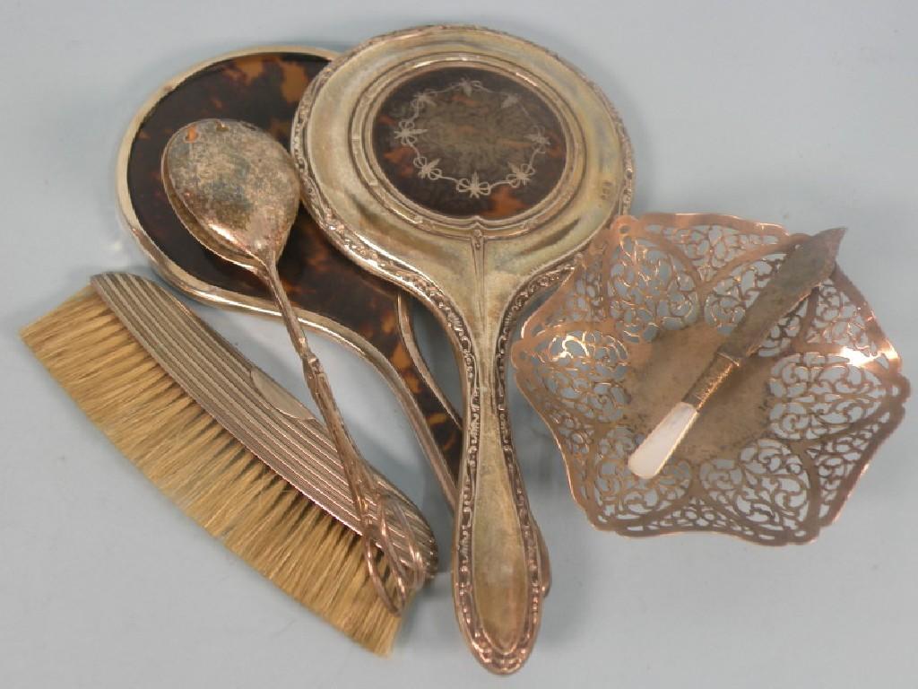 Appraisal: A silver and tortoise shell hand mirror another similar a