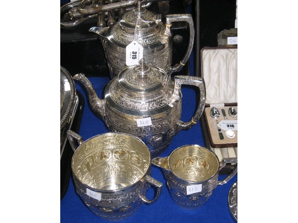 Appraisal: Four piece silver plated tea service decorated with the signs