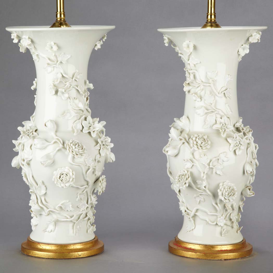 Appraisal: Pair of Chinese White Glazed Porcelain Vases Each mounted as