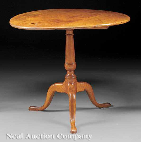 Appraisal: An American Maple Tilt-Top Tea Table th c vasiform support