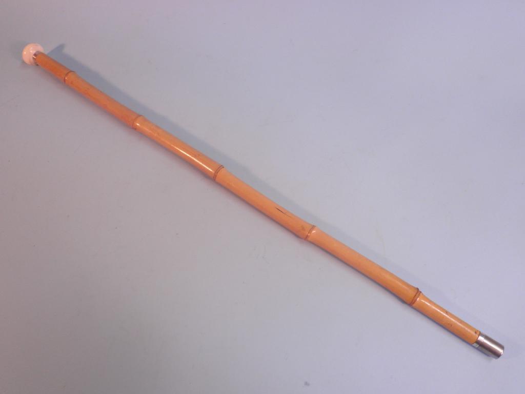 Appraisal: An early thC bamboo walking cane with sterling silver mount