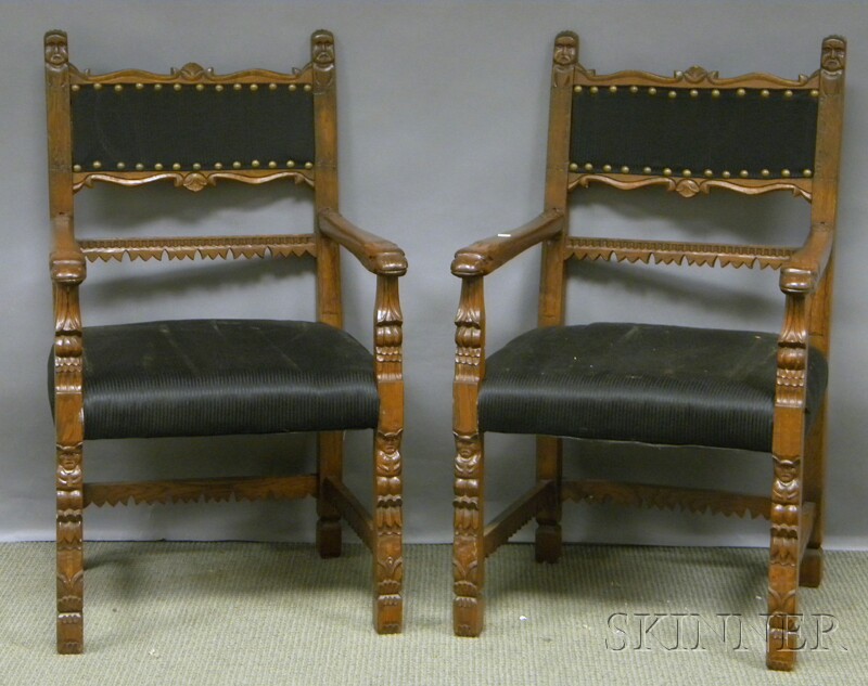 Appraisal: Pair of Fraternal Upholstered Figural Carved Oak Armchairs