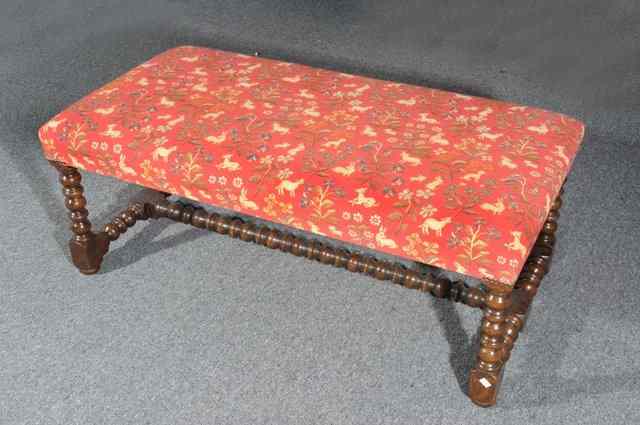 Appraisal: A GEORGIAN STYLE CENTRE STOOL of rectangular form with turned