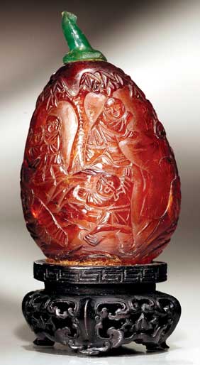 Appraisal: ANTIQUE AMBER SNUFF BOTTLE Remarkably hollowed carved amber snuff bottle