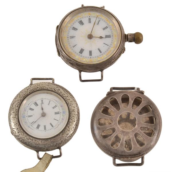 Appraisal: WWI SHRAPNEL GUARD WRISTWATCH CASE TOGETHER WITH TWO OTHER WRISTWATCH