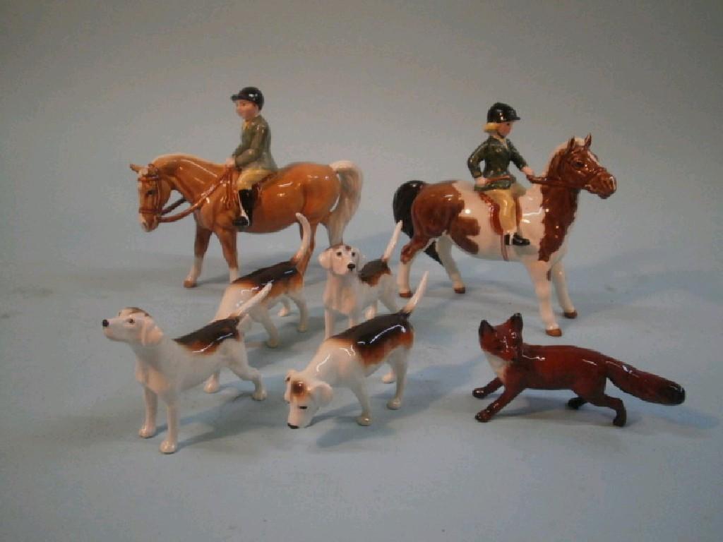 Appraisal: A Beswick skewbald pony and child figure a figure with