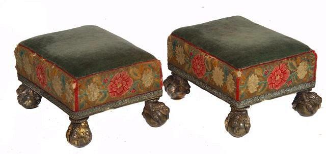 Appraisal: A PAIR OF VICTORIAN TAPESTRY FOOT STOOLS with gilded brass