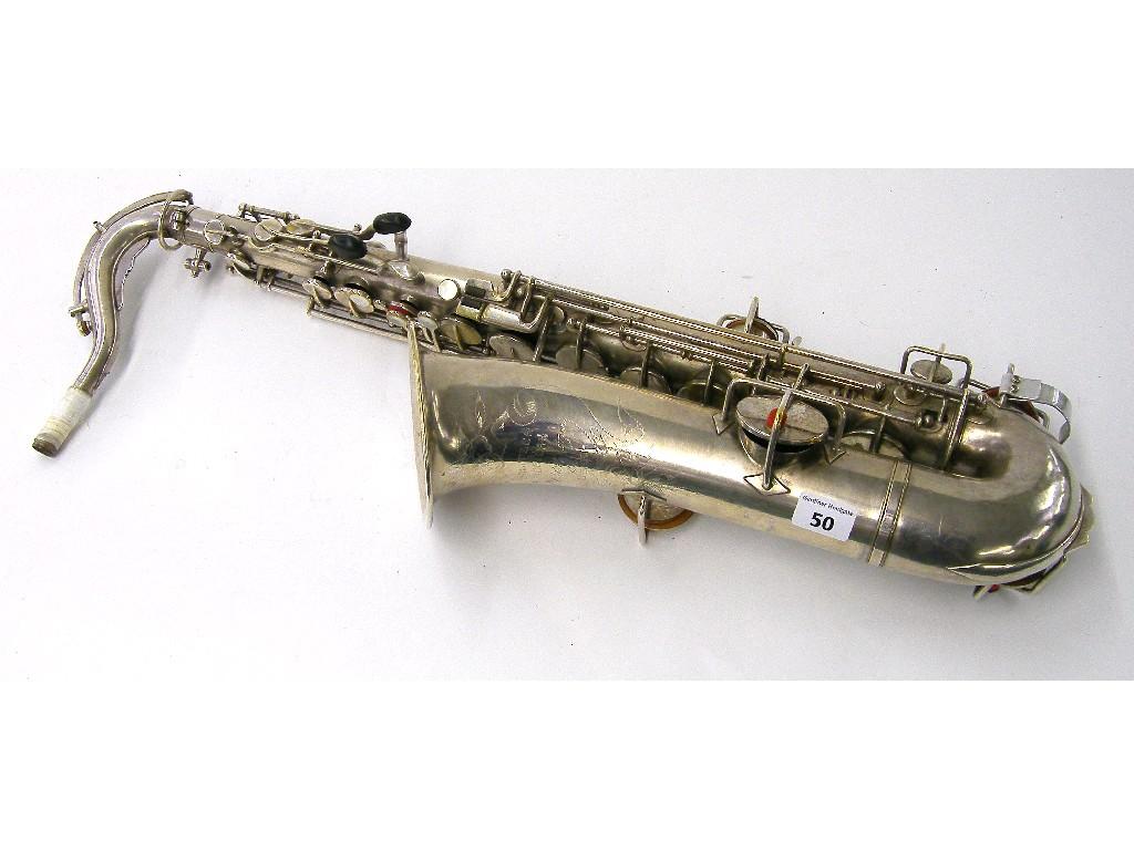 Appraisal: Wurlitzer silver plated alto saxophone the foliate engraved bell stamped