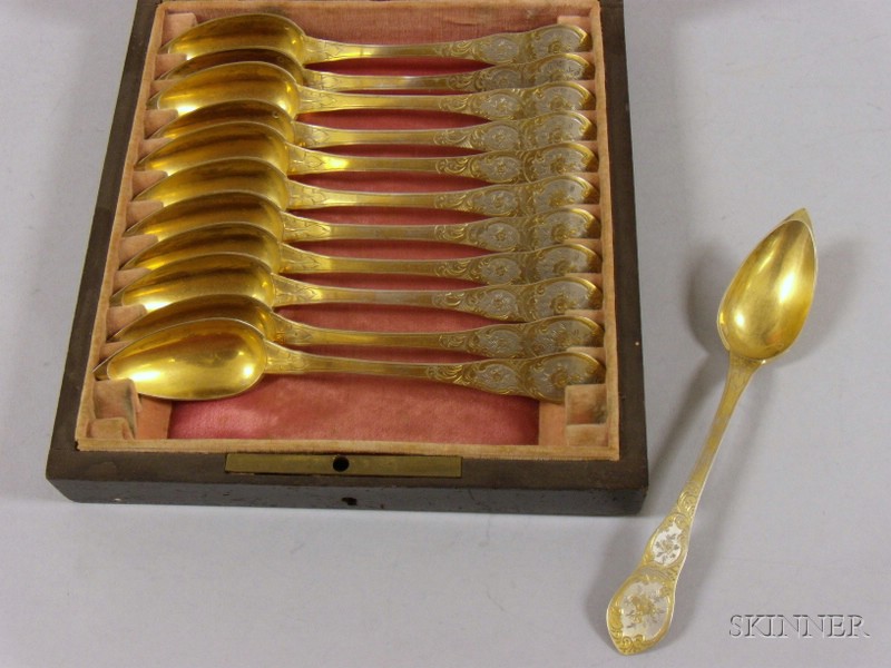 Appraisal: Set of Twelve Cased Silver Spoons with Gold Wash floral