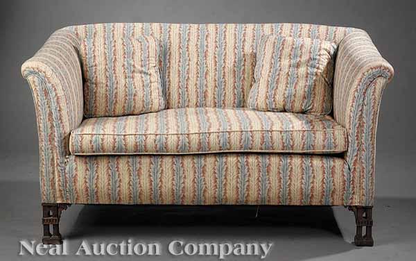 Appraisal: A Chippendale-Style Upholstered Settee with tall back and arms on