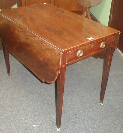 Appraisal: A George III mahogany Pembroke table with cross banded and