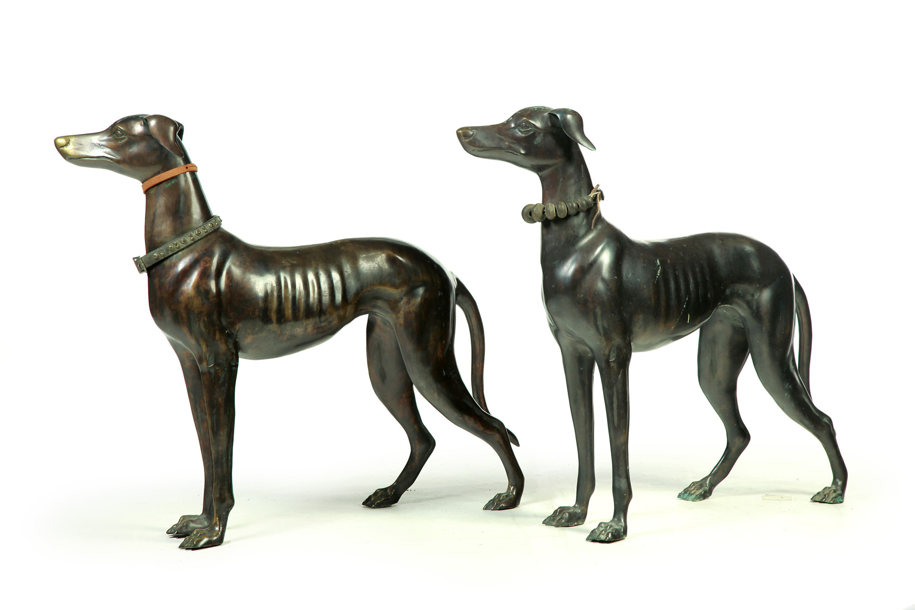 Appraisal: TWO AMERICAN BRONZE WHIPPETS Late th century Standing whippets with