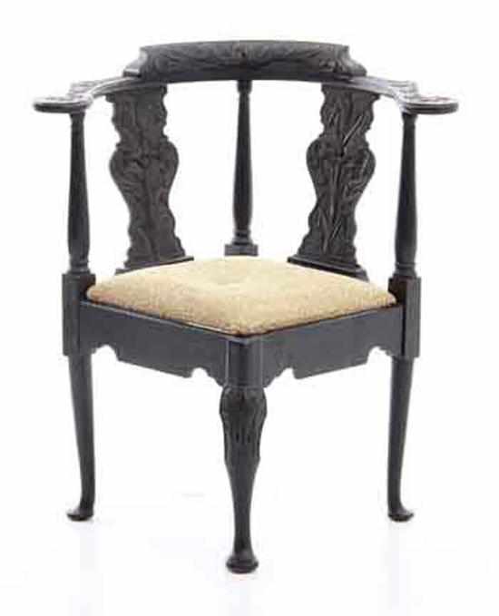 Appraisal: Georgian style carved oak corner chair th century shaped crestrail