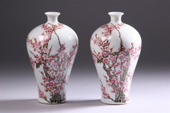 Appraisal: PAIR OF CHINESE FAMILLE ROSE PORCELAIN VASES th century iron