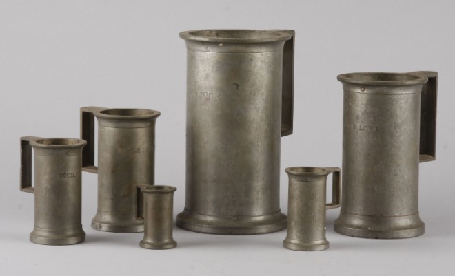 Appraisal: Set of six graduated pewter measures with handles marked J