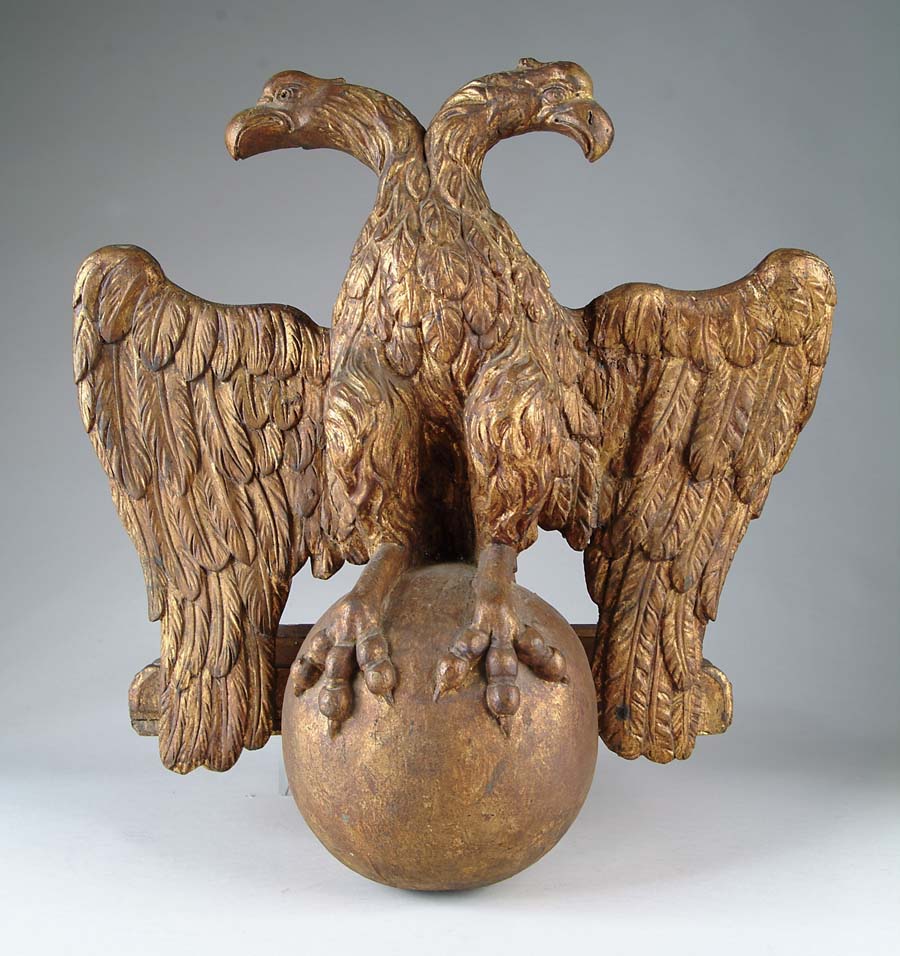 Appraisal: CARVED GILT DOUBLE EAGLE Fantastic carved wooden double eagle is