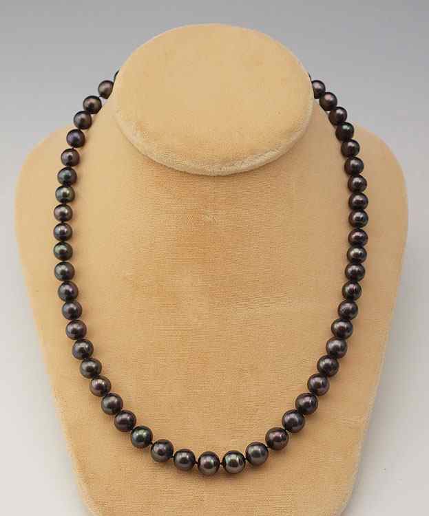 Appraisal: STRAND OF BLACK PEARLS Strand of black mm freshwater cultured