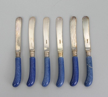 Appraisal: A Set of Six English Knives with Porcelain Handles in