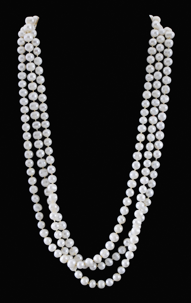 Appraisal: Freshwater Cultured Pearl Necklace round creamy white pearls to mm