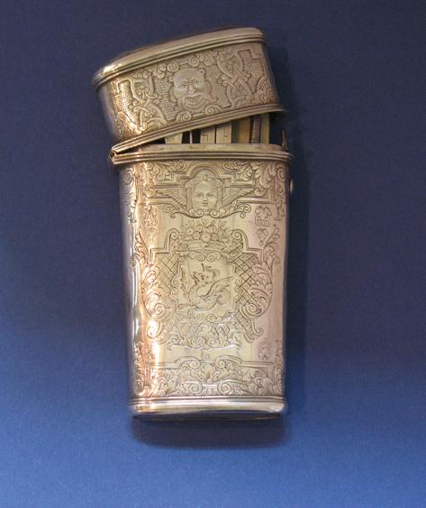 Appraisal: A GEORGE II ETUI of tapering rectangular form with reeded