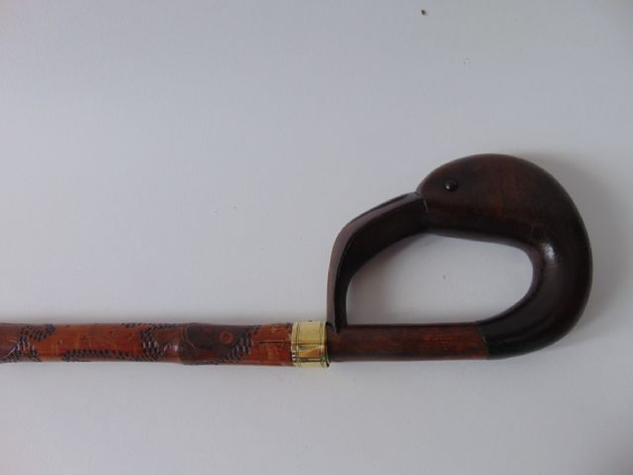 Appraisal: An unusual eastern bamboo walking cane with incised decoration of