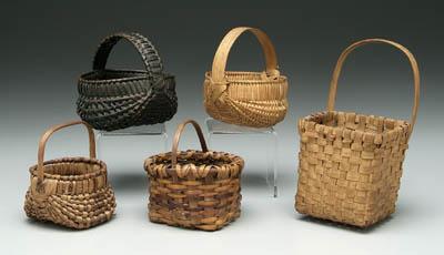 Appraisal: Five miniature baskets oak split wall basket in minor breaks