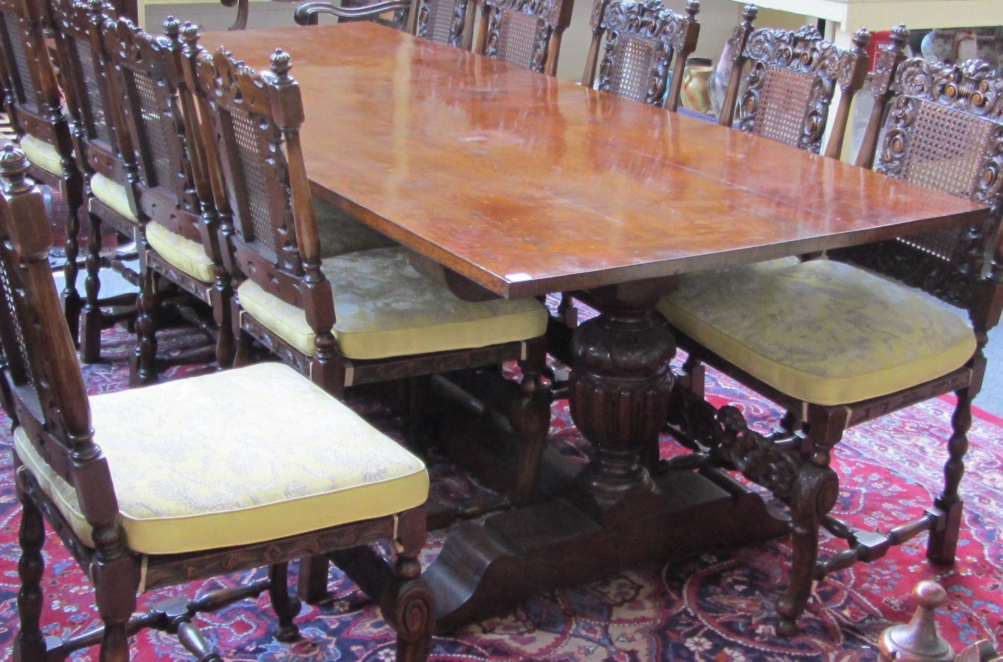 Appraisal: A large th century style oak rectangular extending refectory table