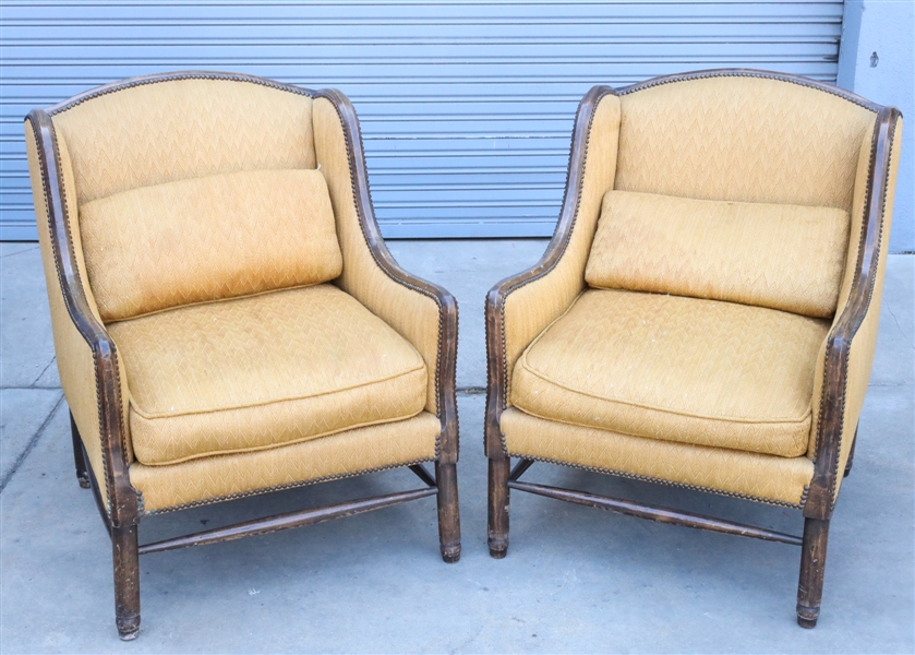 Appraisal: Pair of large carved wood and upholstered arm chairs as-is