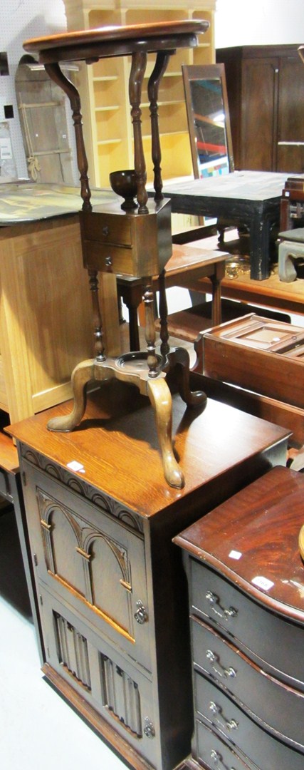 Appraisal: A carved oak side cupboard together with an th century