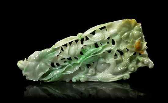 Appraisal: A Pierce Carved Jade Plaque of multicolored stone with apple