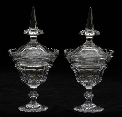 Appraisal: PAIR OF ANGLO-IRISH CUT-GLASS JARS AND COVERS In the Regency