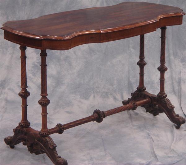 Appraisal: Rosewood Rococo Revival scalloped top center table on turned trestle