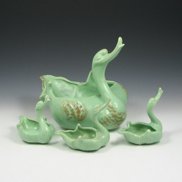 Appraisal: Hull Novelty Swans Lot of four swans in Capri green