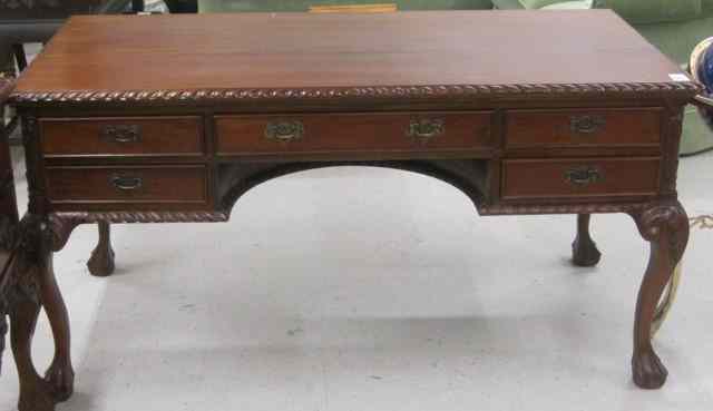 Appraisal: CHIPPENDALE STYLE FLAT-TOP MAHOGANY DESK having a rectangular top over