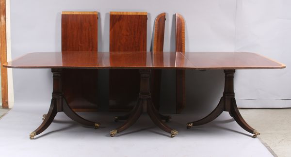 Appraisal: Early th Century custom Sheraton style triple pedestal mahogany dining