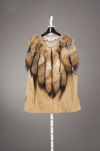 Appraisal: Jacques Ferber Furs tan suede vest with long animal tail