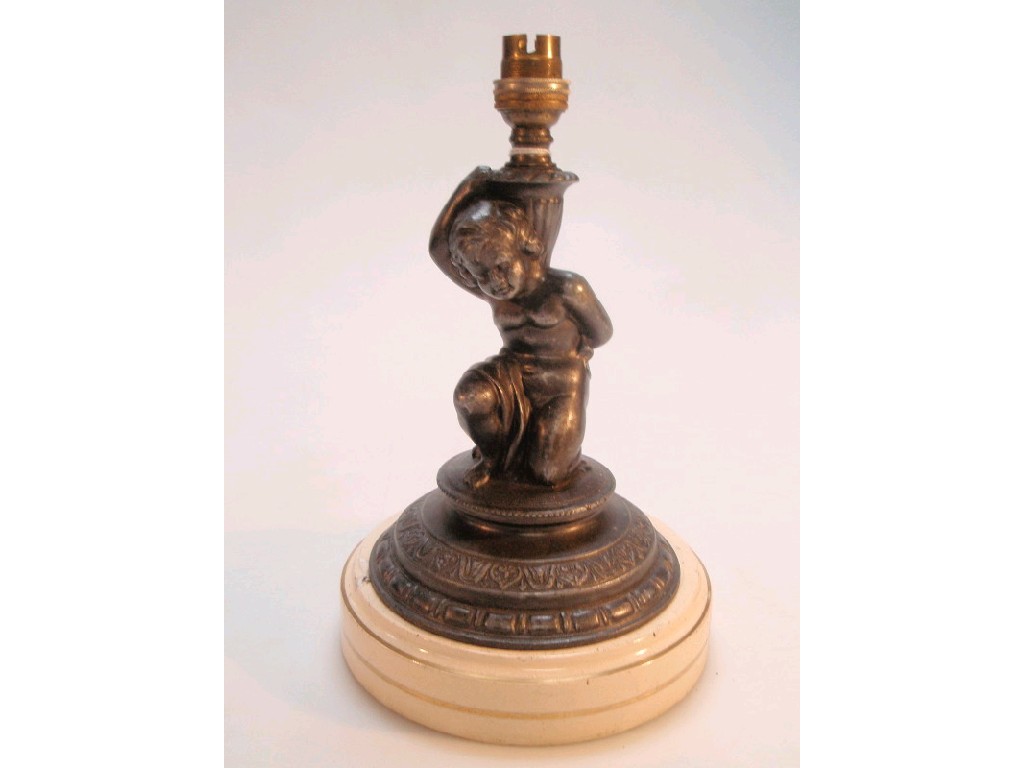 Appraisal: A early thC spelter lamp base modelled or cast as