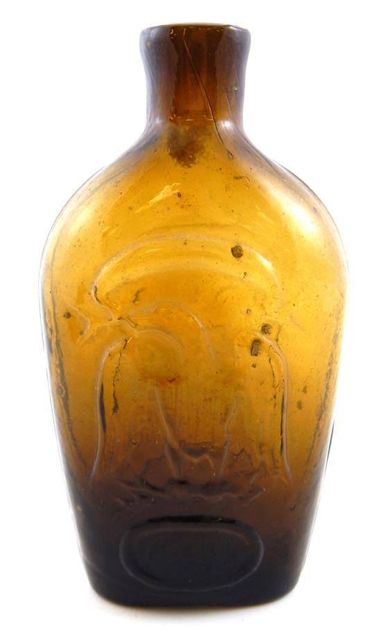 Appraisal: GLASS EAGLE-EAGLE bottle Granite Glass Works amber half pint open