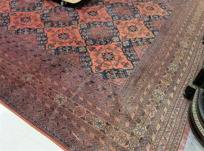 Appraisal: AFGHANI TRIBAL CARPET hand knotted in an overall cruciform medallion