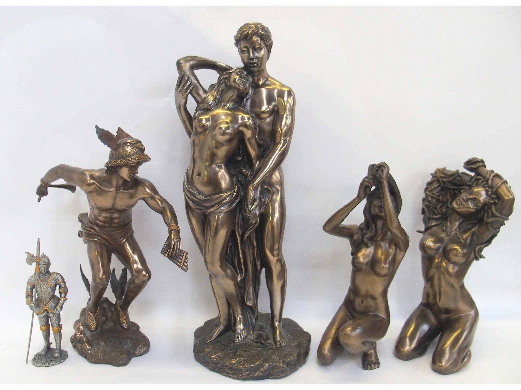 Appraisal: Four bronzed resin figures including Mercury and Medusa and a