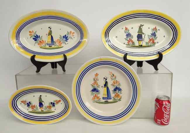 Appraisal: Lot of four Quimper faience platters Classic Breton peasant pattern