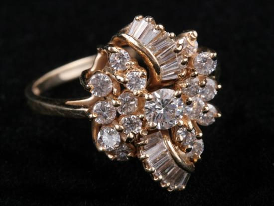 Appraisal: K YELLOW GOLD AND DIAMOND COCKTAIL RING mixed-cut diamonds tcw