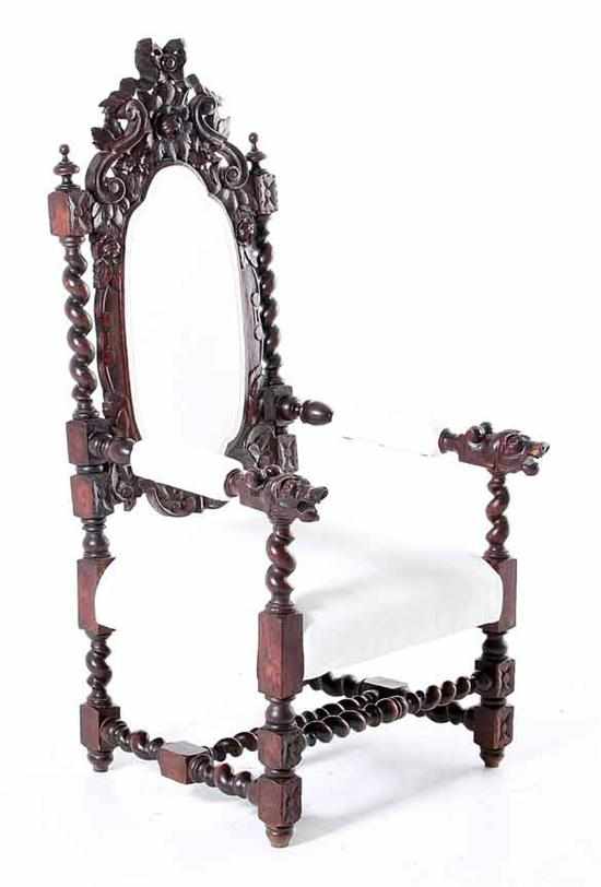 Appraisal: Continental carved oak armchair th century foliate carved and pierced