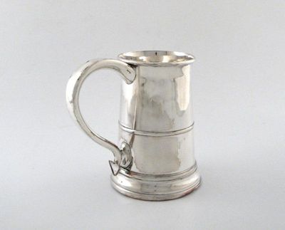 Appraisal: An old Sheffield plate tankard of tapering form on stepped