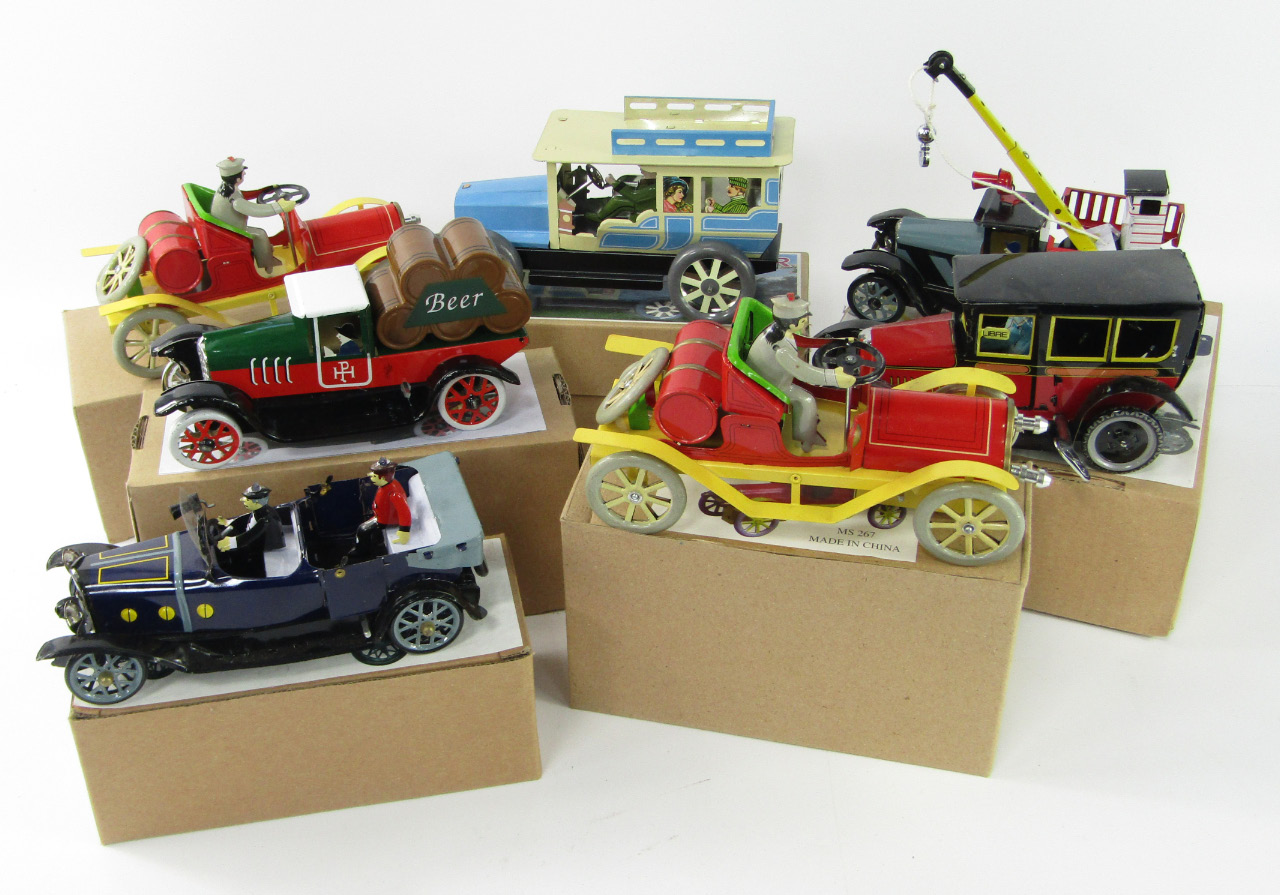 Appraisal: A collection of model tinplate clockwork cars with original boxes