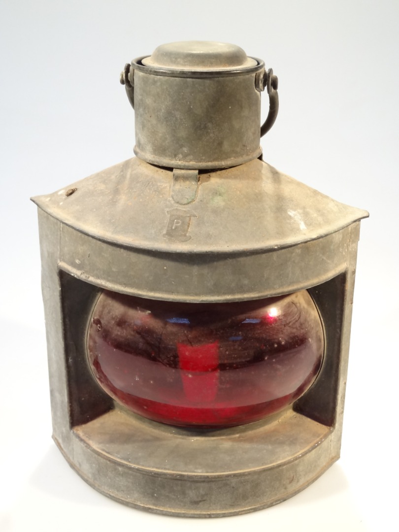 Appraisal: A late thC metal cased ship's lantern of triangular outline