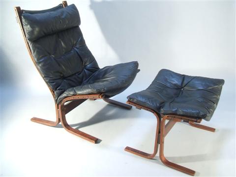 Appraisal: INGMAR RELLING STYLE EASY CHAIR AND OTTOMAN Designed by Ingmar