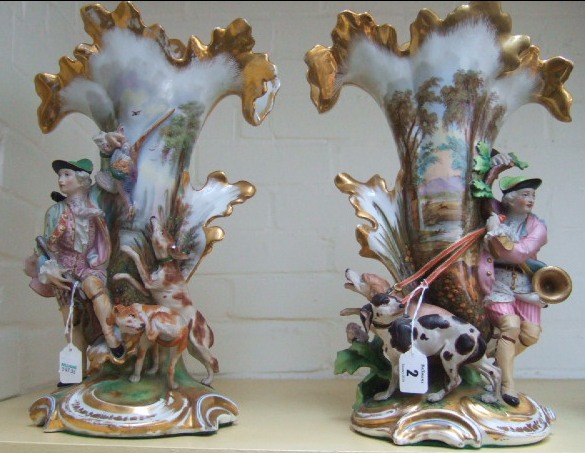 Appraisal: A pair of Paris porcelain figural vases circa each flared